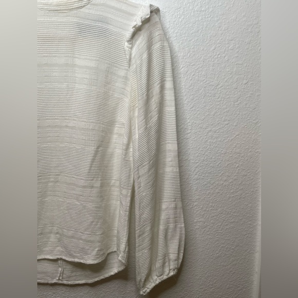 Reformation Cream Mock neck long sleeve blouse xxs
Purchased from The Real Real - Picture 6 of 14